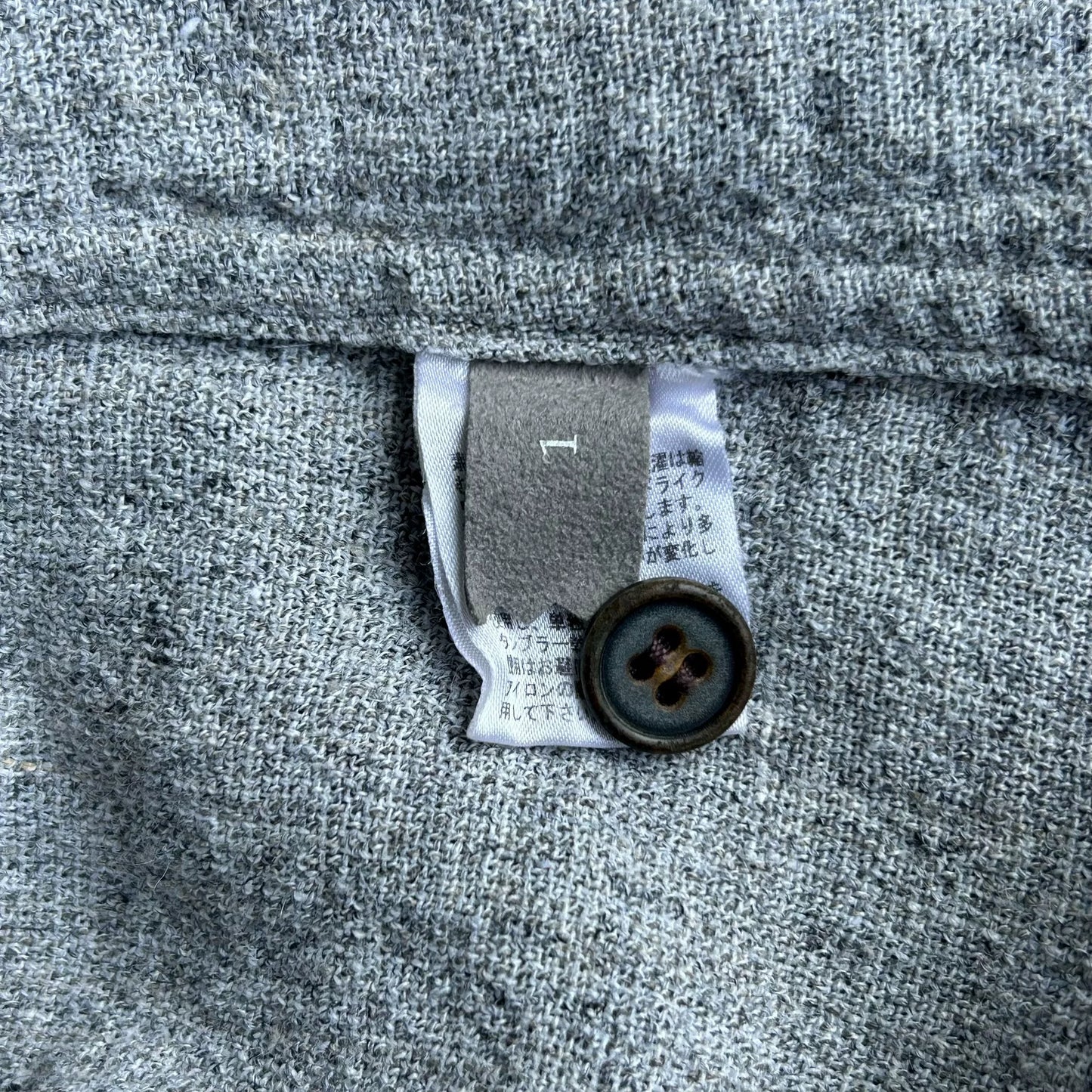 gray linen button-up shirt by Yuta Matsuoka