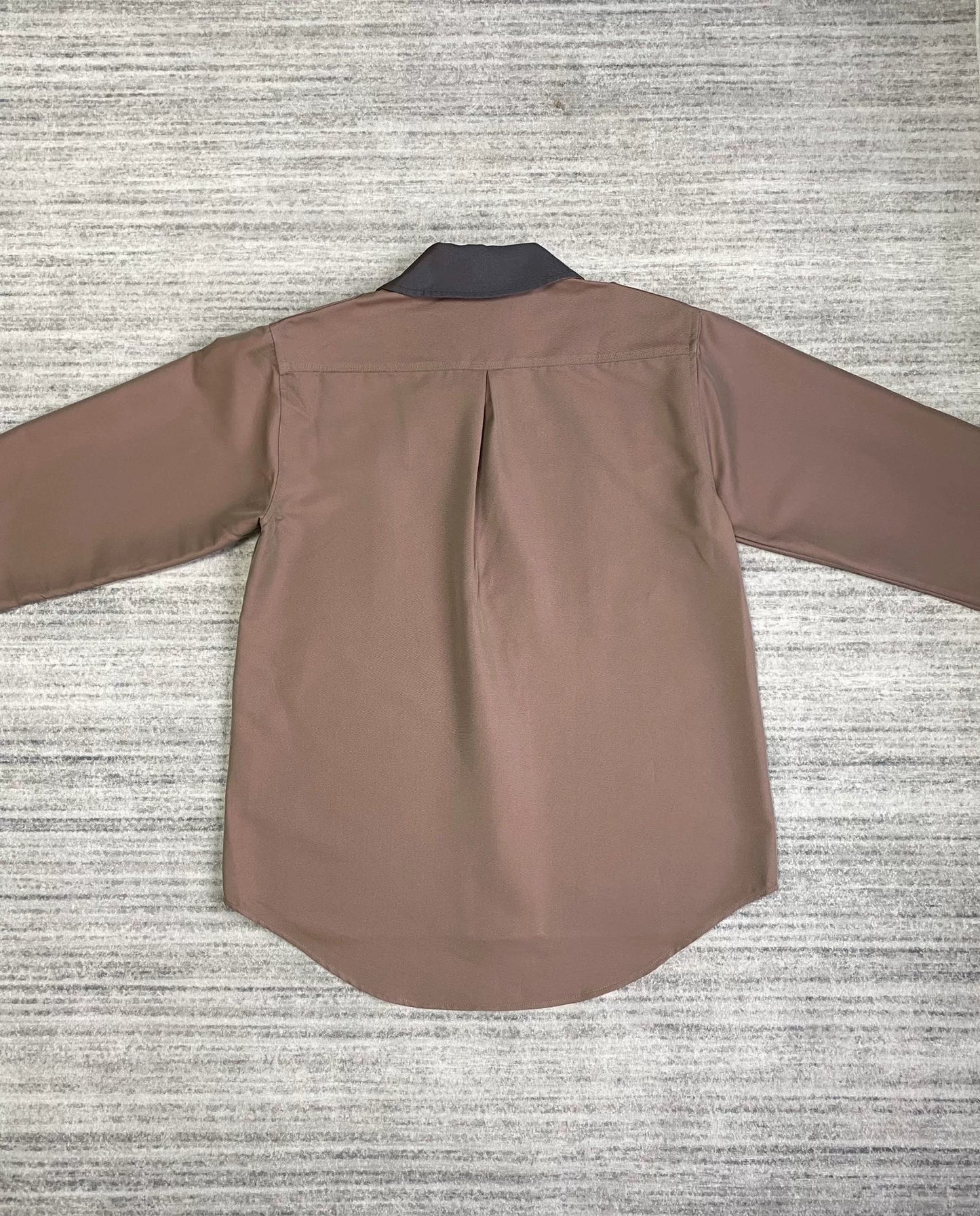 brown patchwork jacket by Kiko Kostadinov