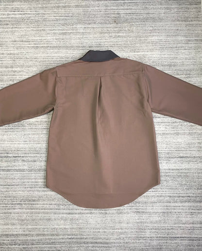 brown patchwork jacket by Kiko Kostadinov