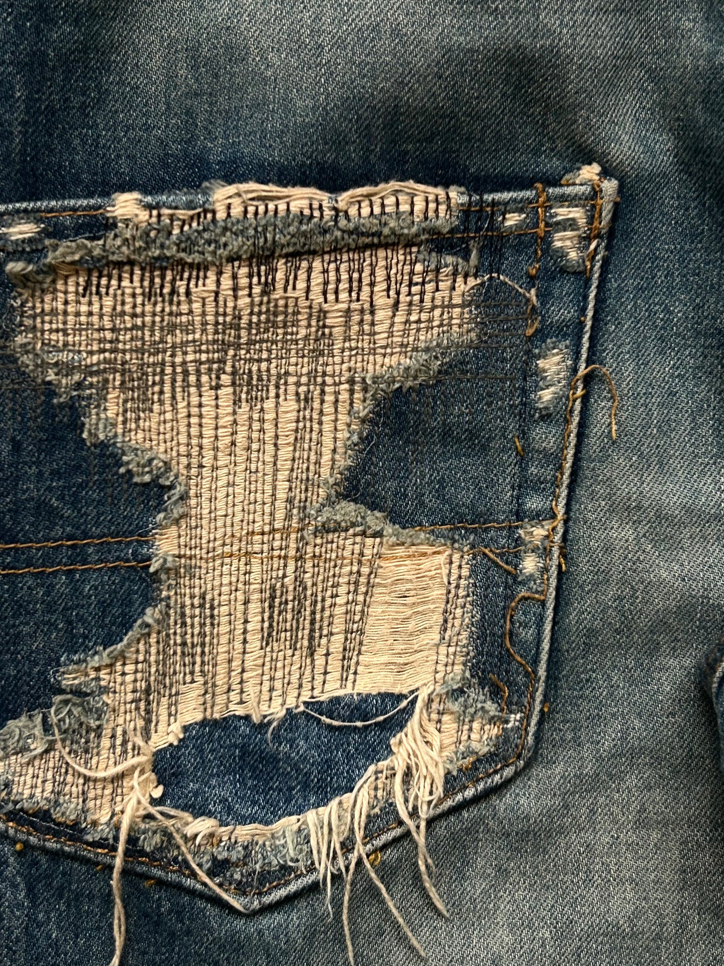 undercover love lightning denim pants