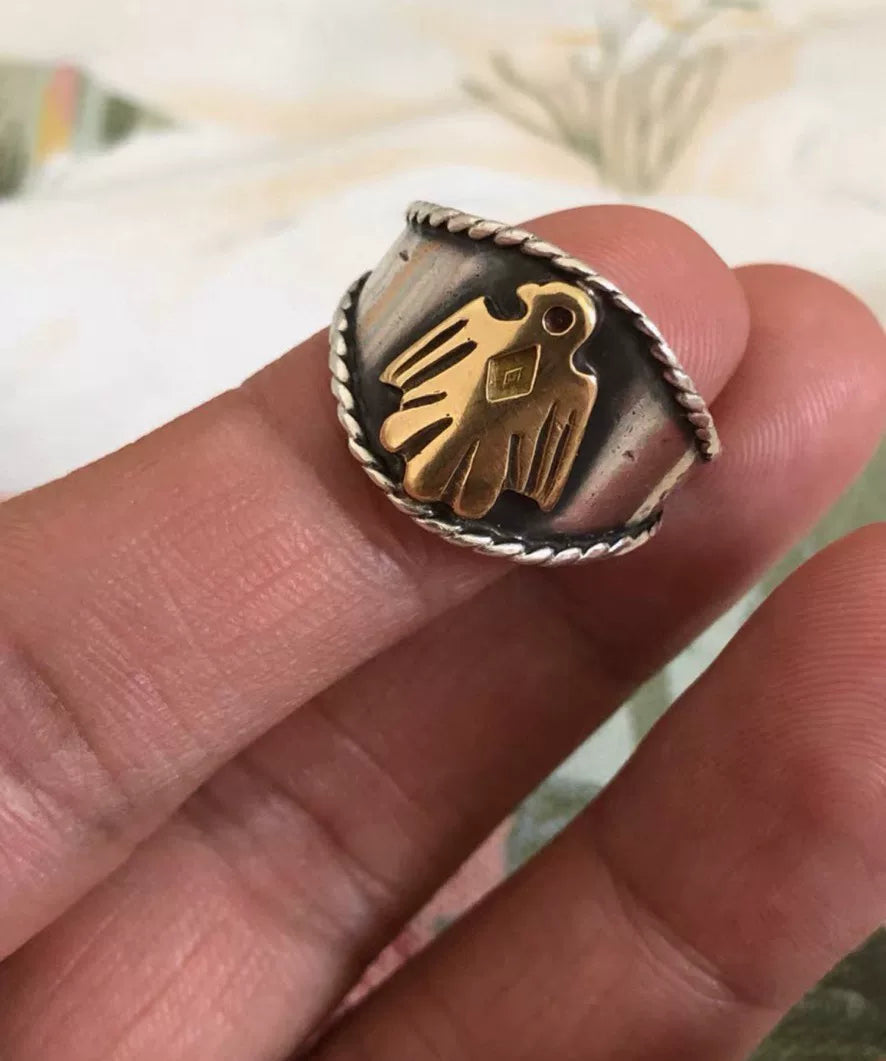 goros eagle ring with silver and gold details