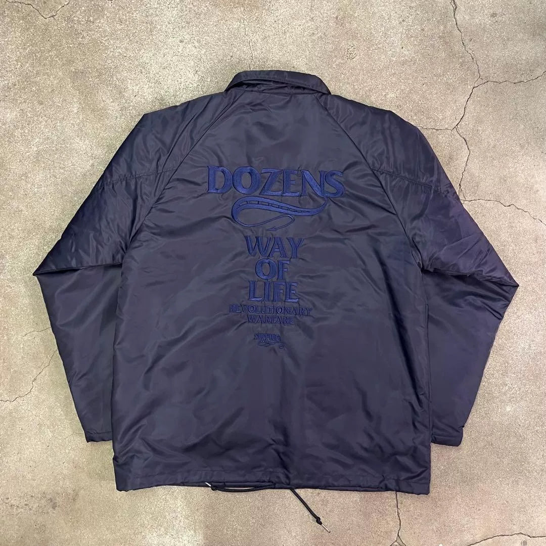 navy blue coach jacket with logo