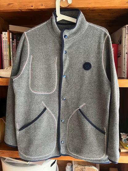 stylish gray fleece jacket with blue accents