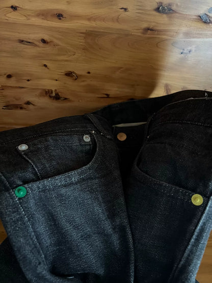 visvim black denim pants with colorful details