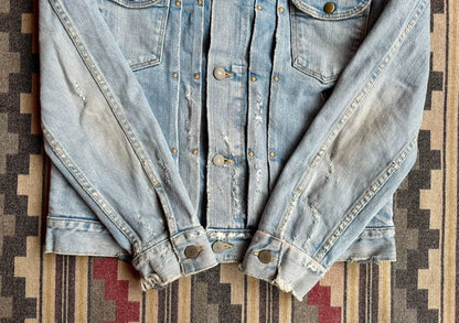 denim jacket with distressed details