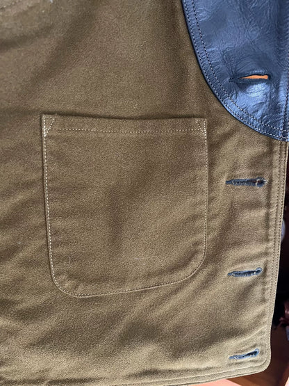 black leather vest with military green lining