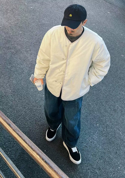 nanamica reversible down cardigan in ecru