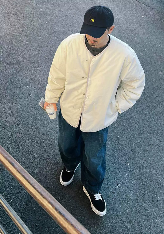 nanamica reversible down cardigan in ecru