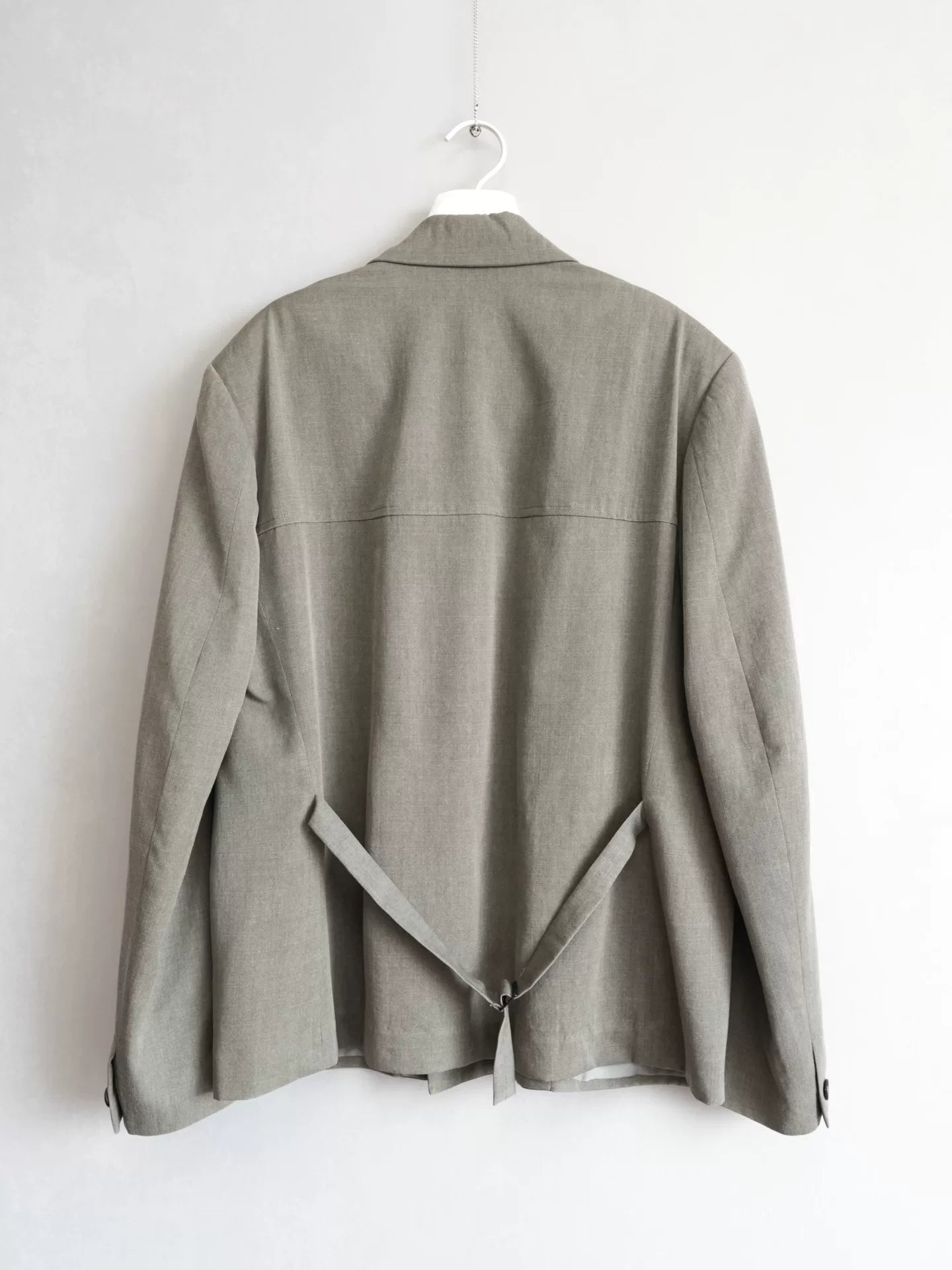 double-breasted concrete gray jacket