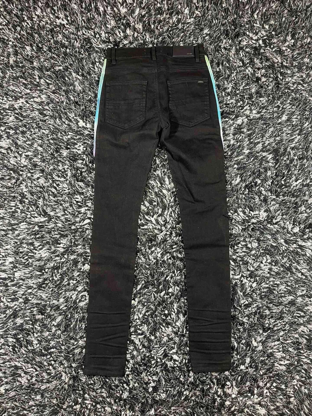 amiri watercolor half track jean
