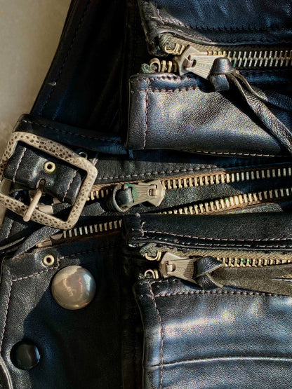 black leather biker jacket with detailed embellishments