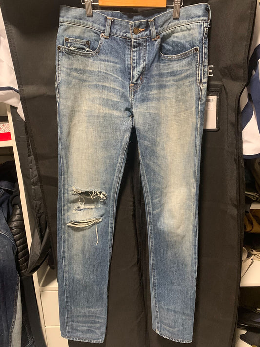 saint laurent distressed denim jeans for sale
