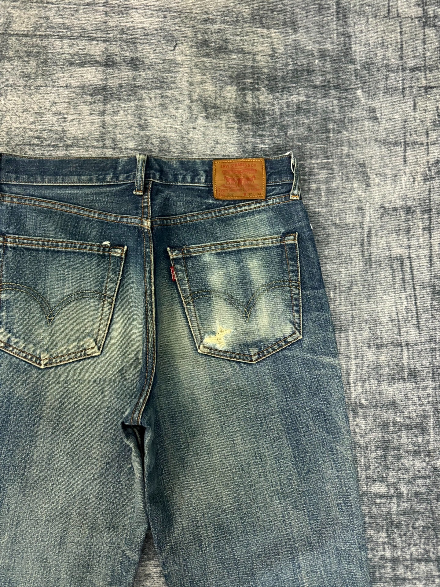 Vintage Levi's 502 Japanese Washed Blue Jeans