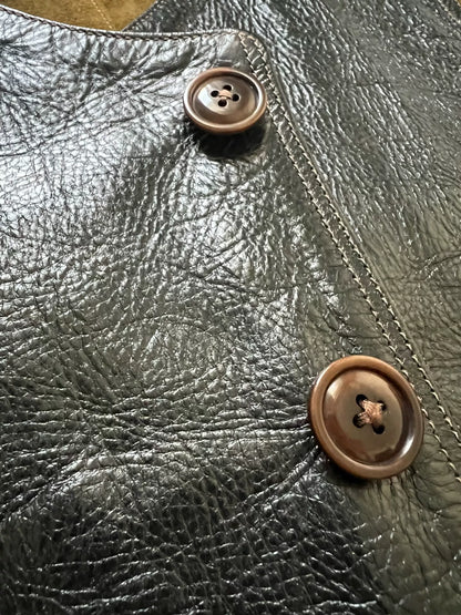 black leather vest with military green lining