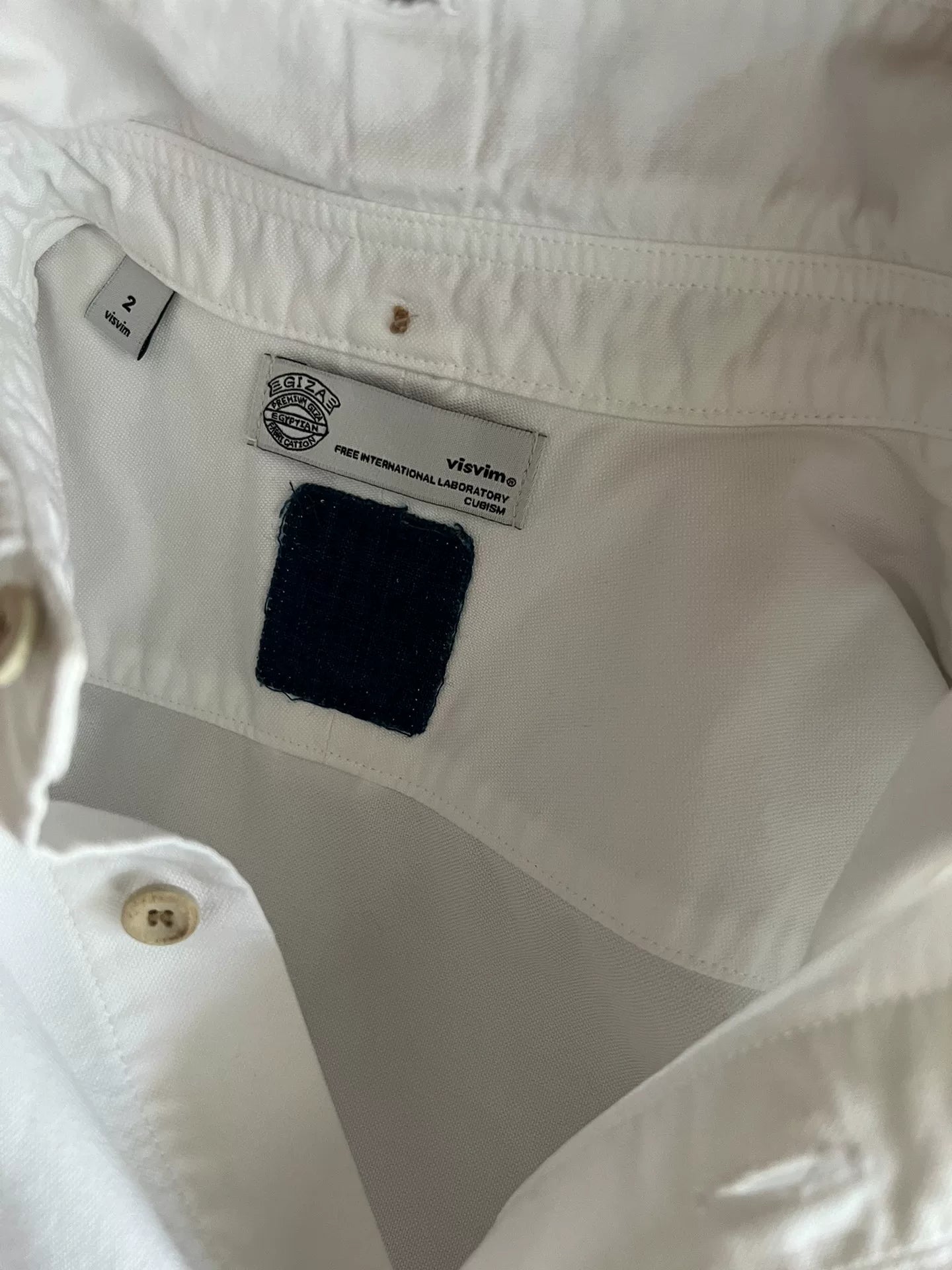 white drop sleeve shirt with paisley design