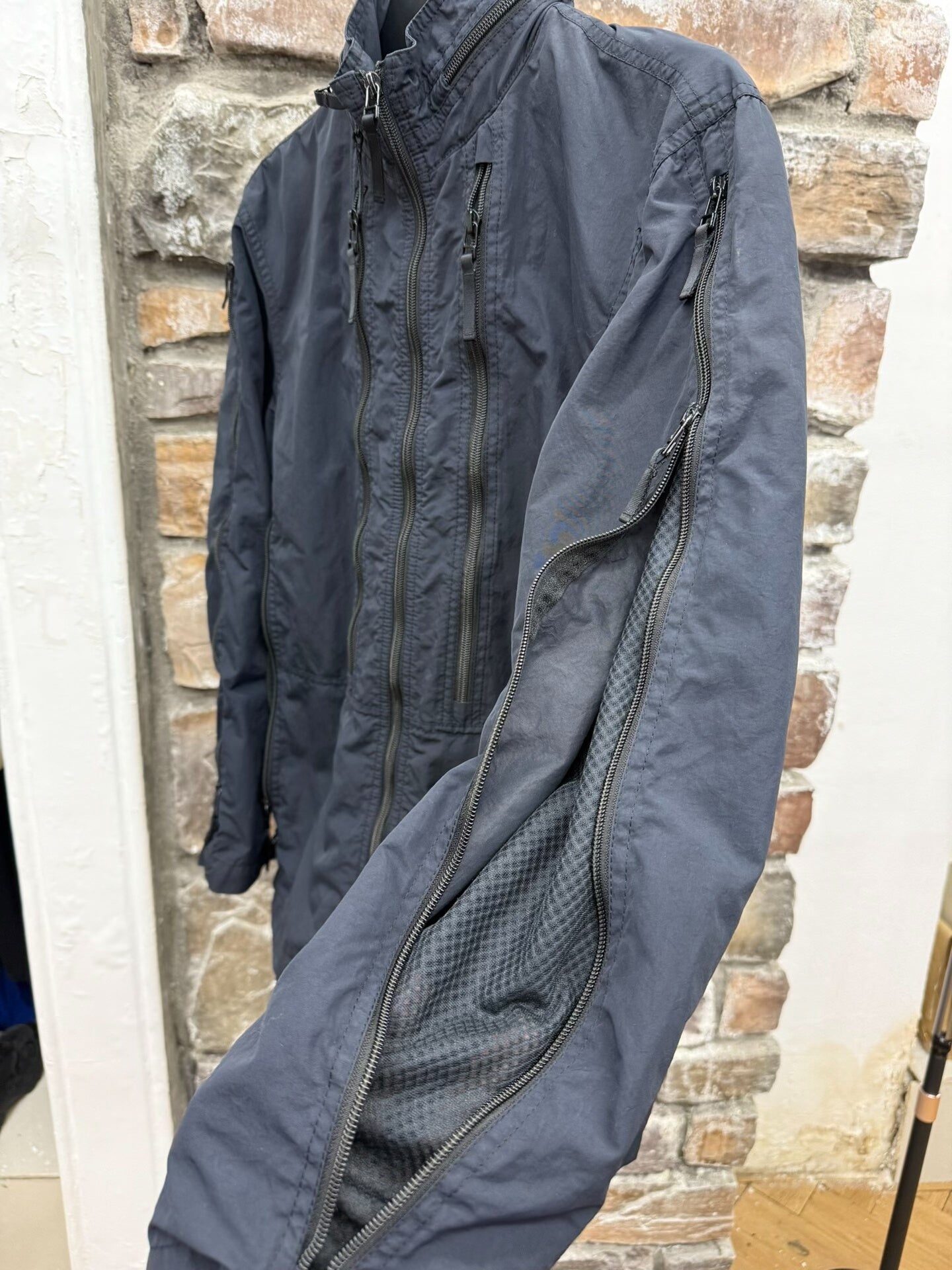 issey miyake zip-up jacket with damaged zipper