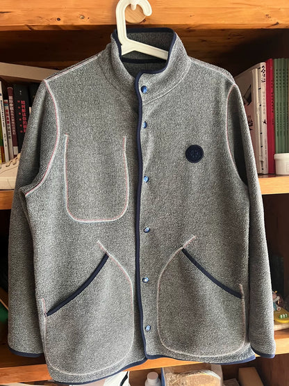 stylish gray fleece jacket with blue accents