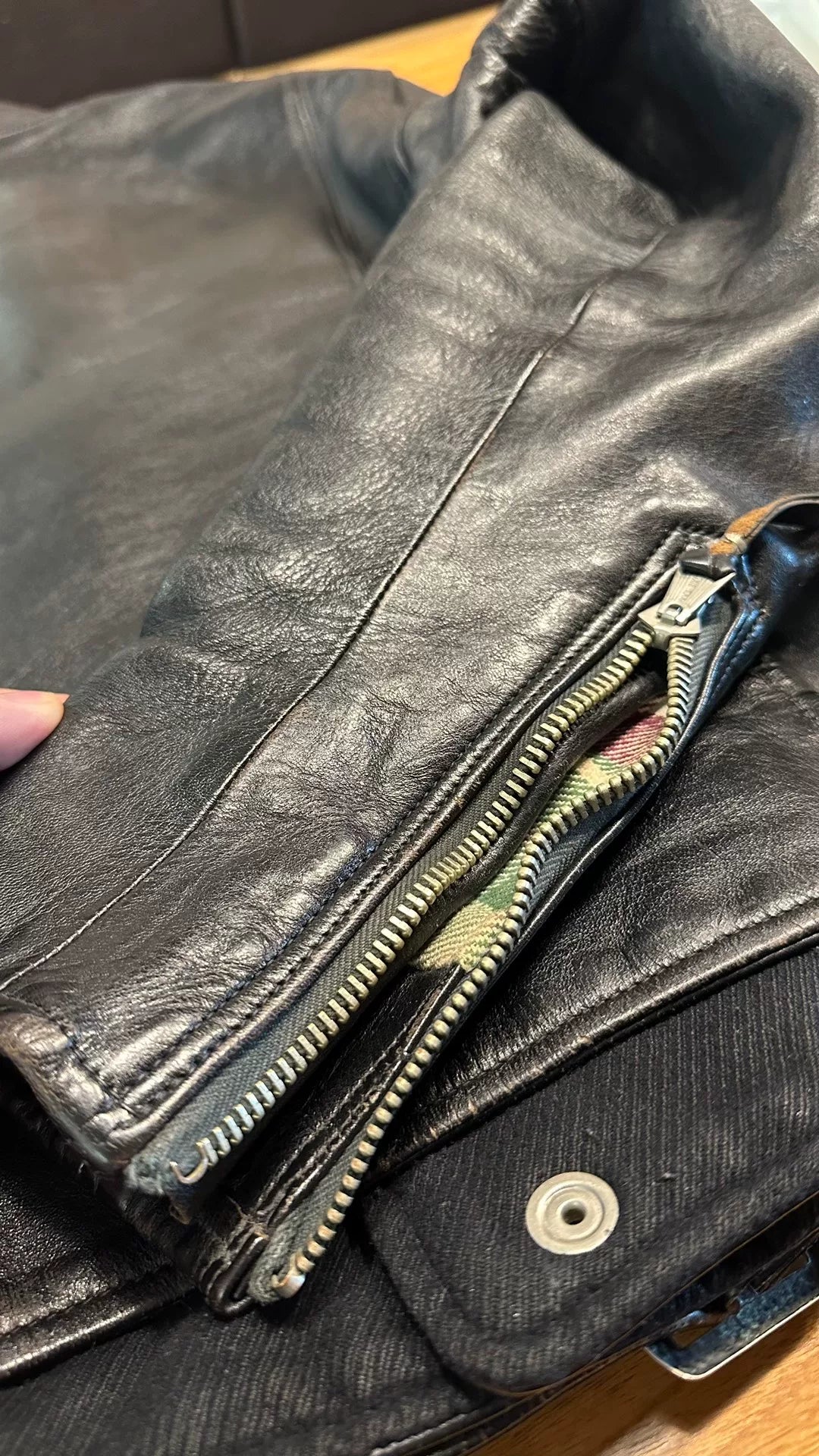 rare black leather biker jacket with buttons