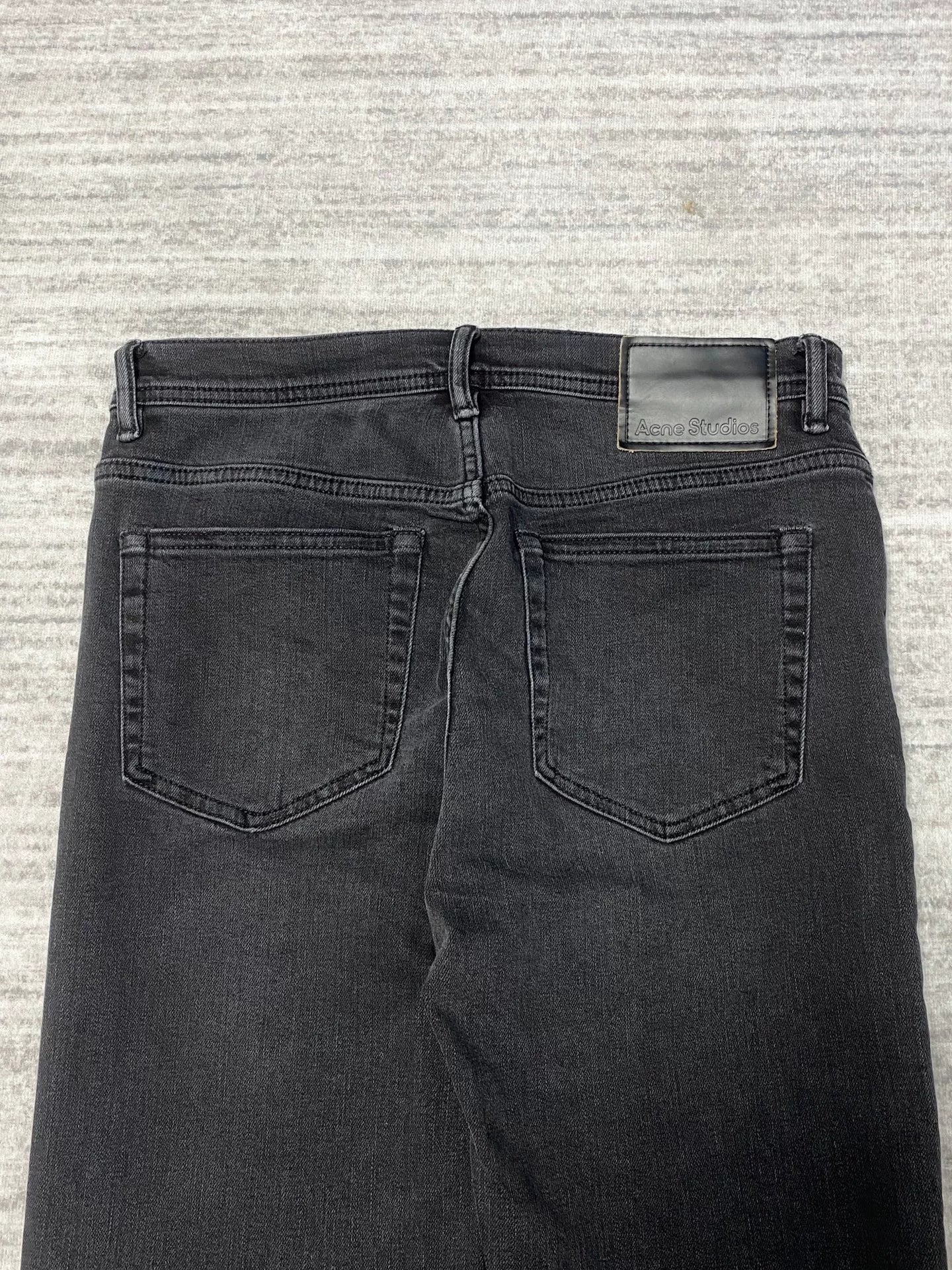 black slim-fit straight-leg jeans