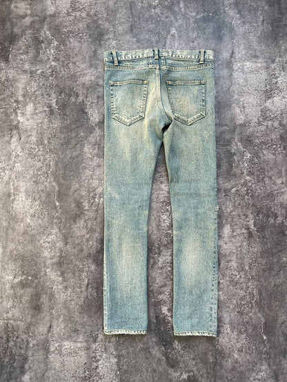 Saint Laurent Distressed Light Blue Jeans