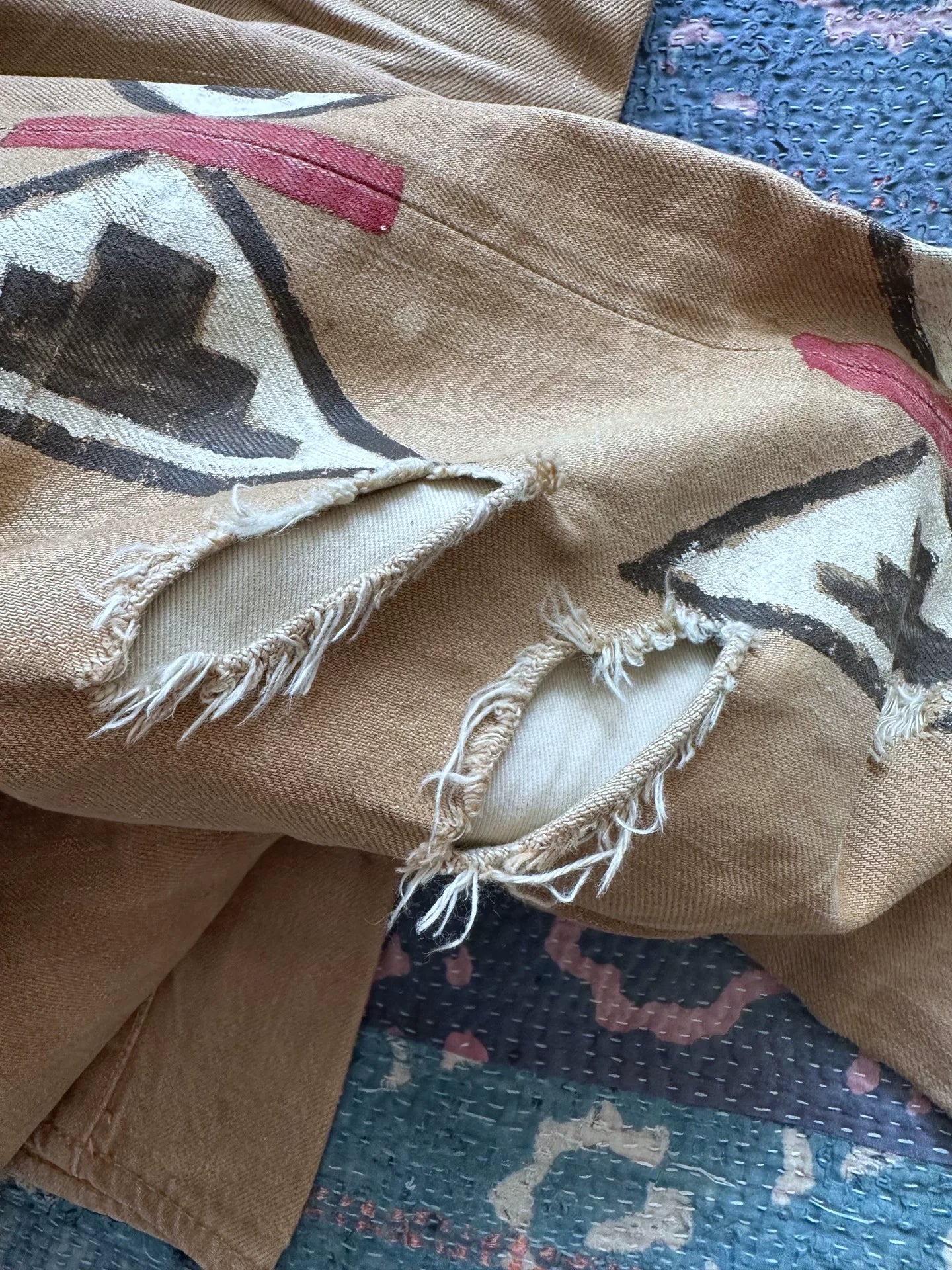 hand-painted limited edition distressed denim pants