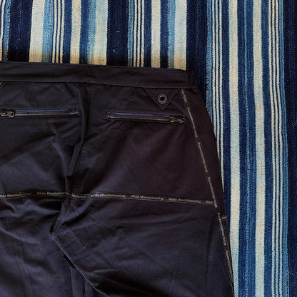 white mountaineering functional shorts with quick-dry fabric