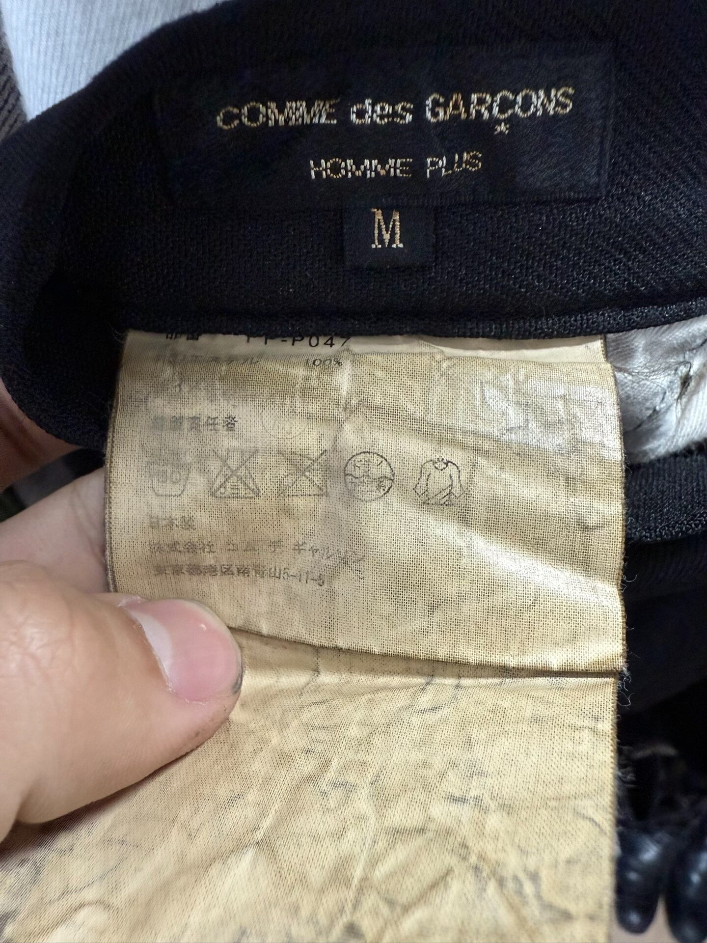 comme des garcons homme plus black pants