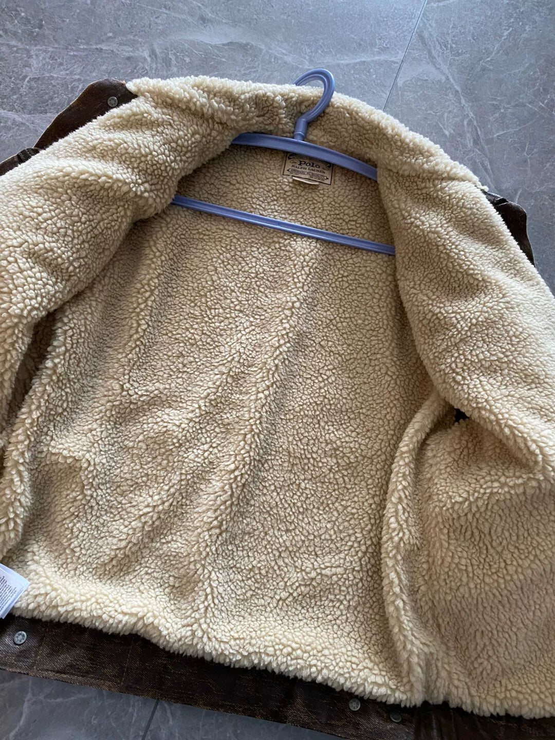 brown leather jacket with fur collar