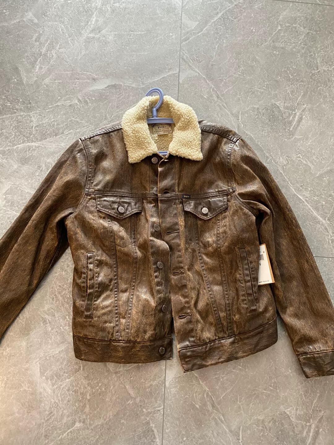 brown leather jacket with fur collar