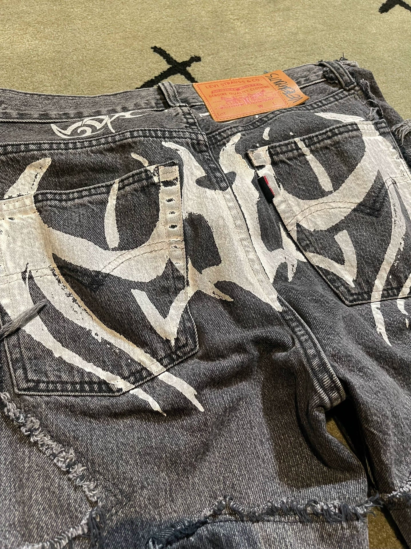 vetements 19 deconstructed tattoo denim pants