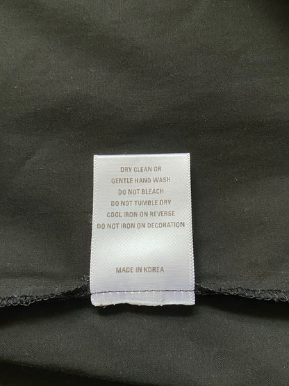 black pocket shirt with hidden buttons