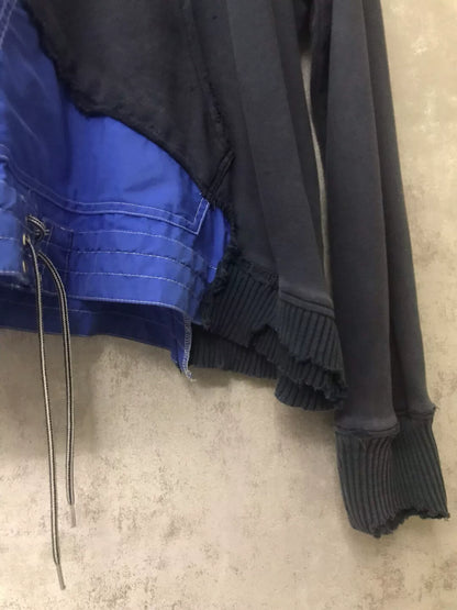 layered hooded sweatshirt with unique details