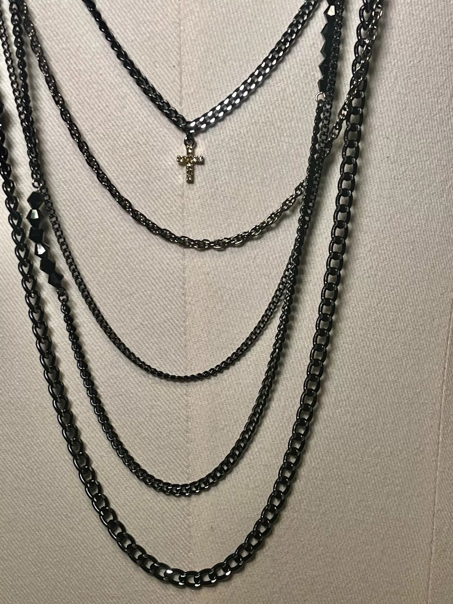 adjustable black cross necklace with charms