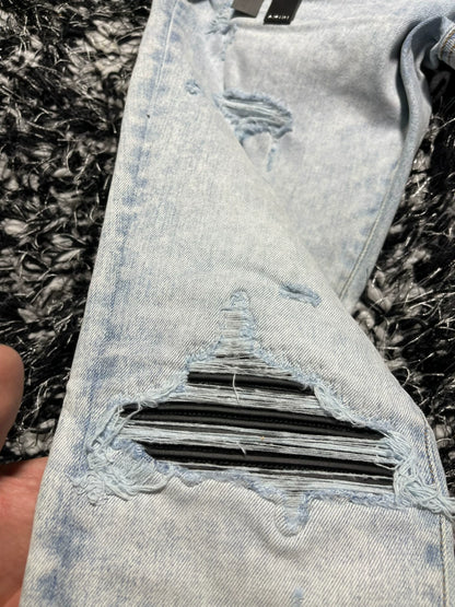 amiri mx1 distressed skinny jeans