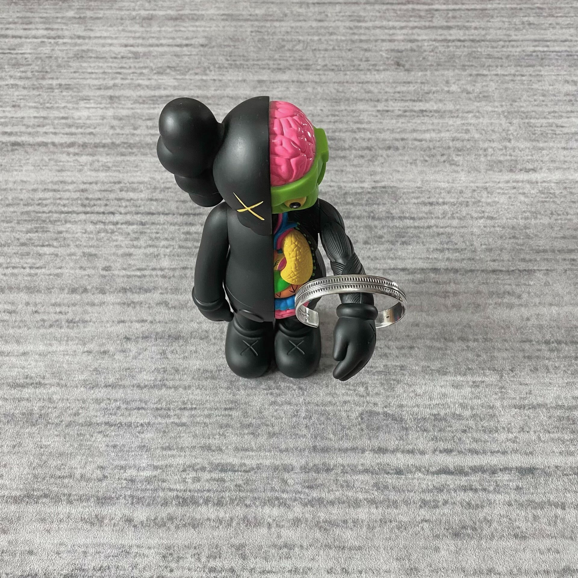 silver adjustable bracelet with teeth design