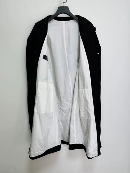 black double-breasted wool long coat