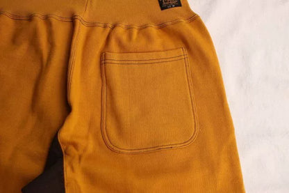 stylish yellow and brown sweatpants