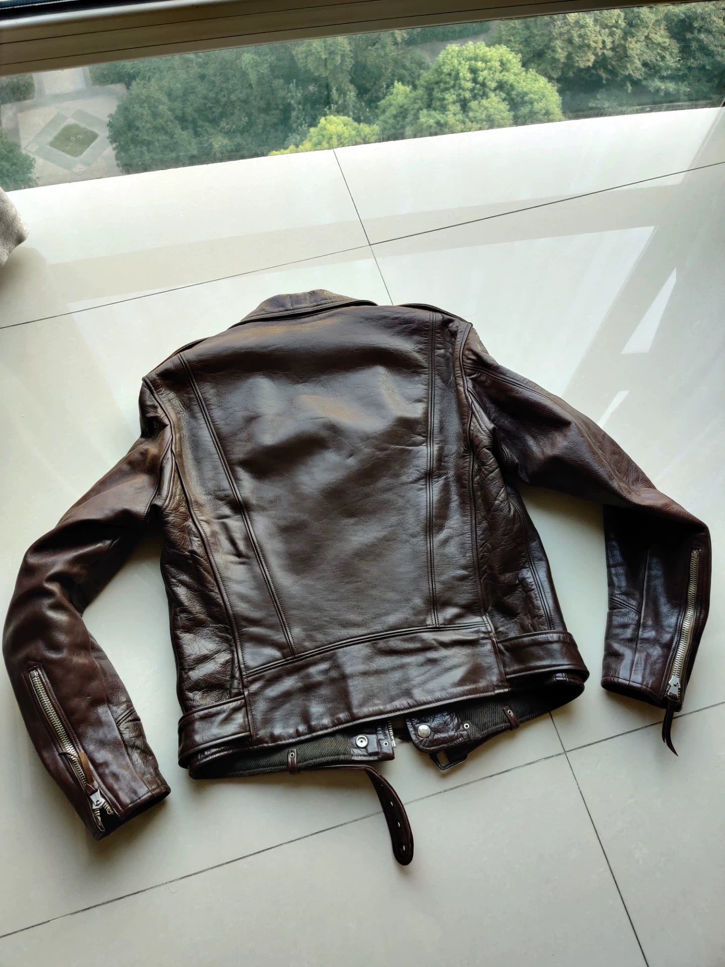stylish brown leather biker jacket