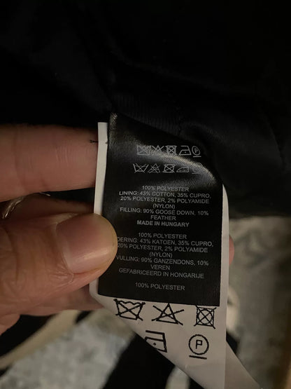 oversized black and white cow print coat