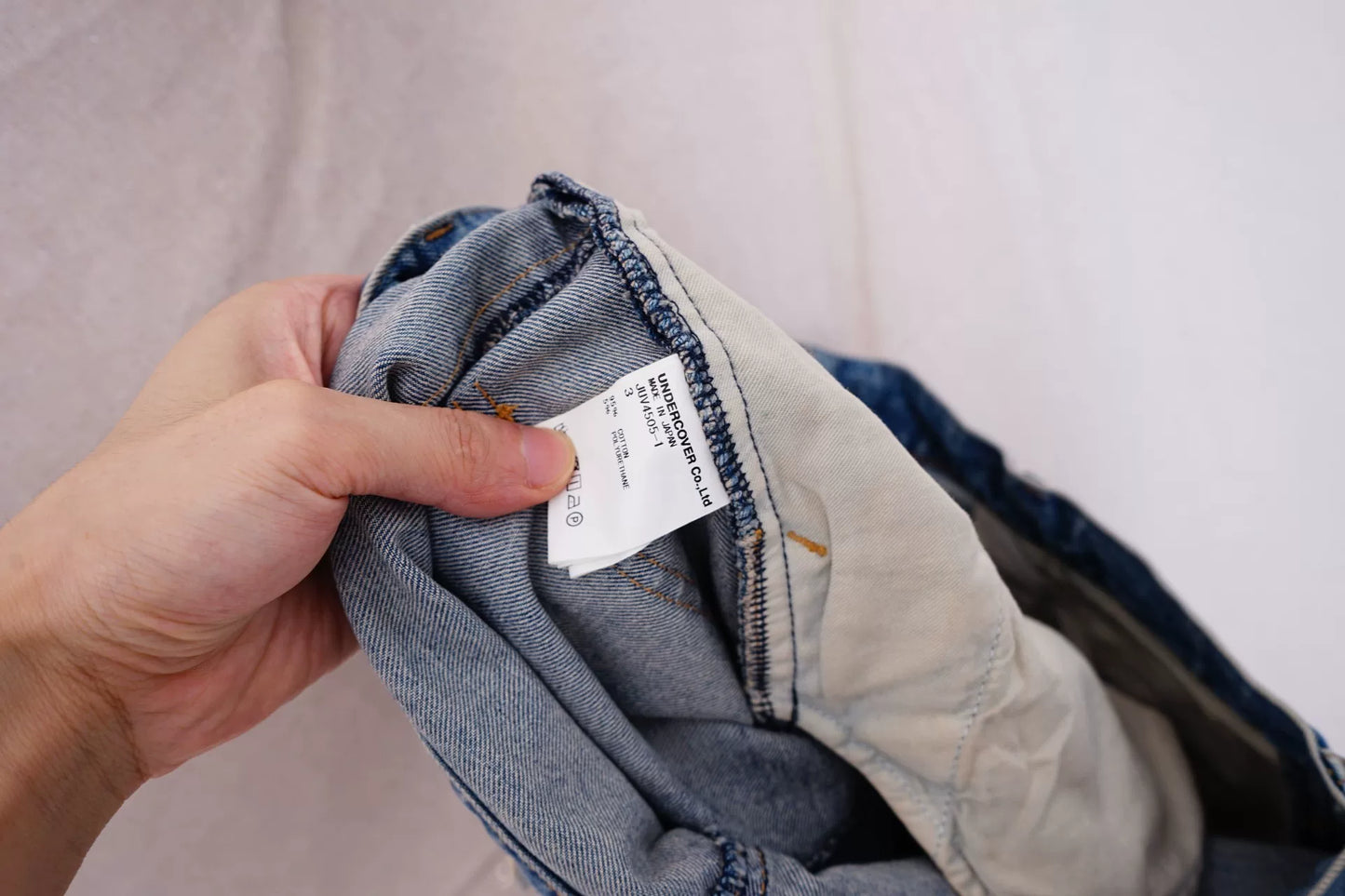 Undercover Spliced Washed Jeans