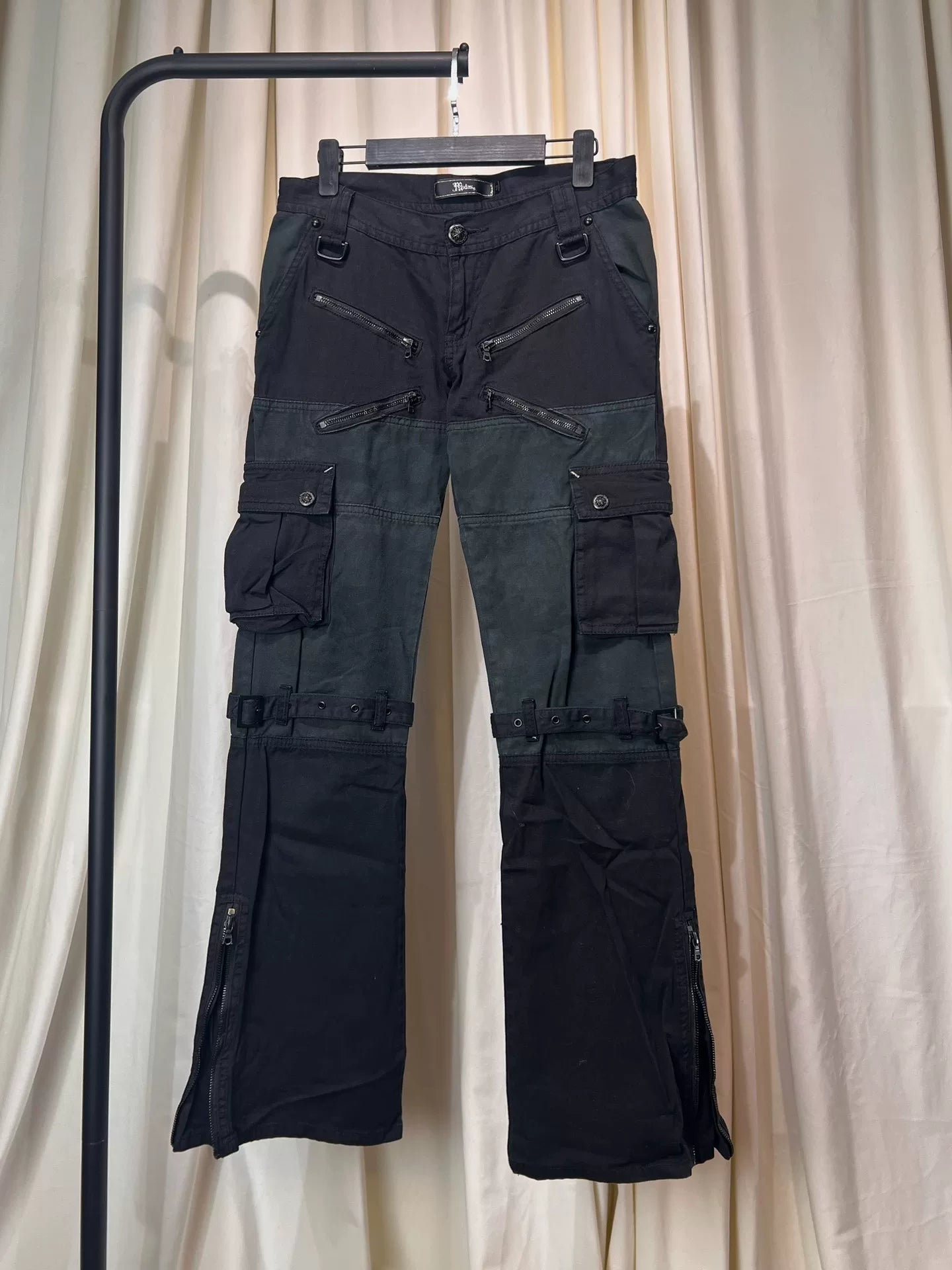 dark avant-garde cargo pants with zippers