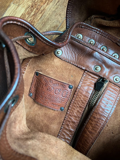 brown leather RRL backpack with pockets