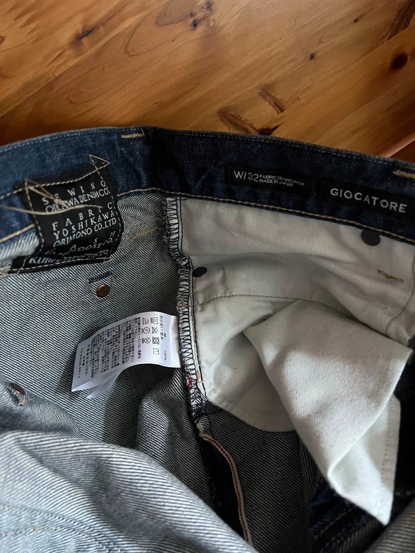 washed red ear denim talon zipper pants