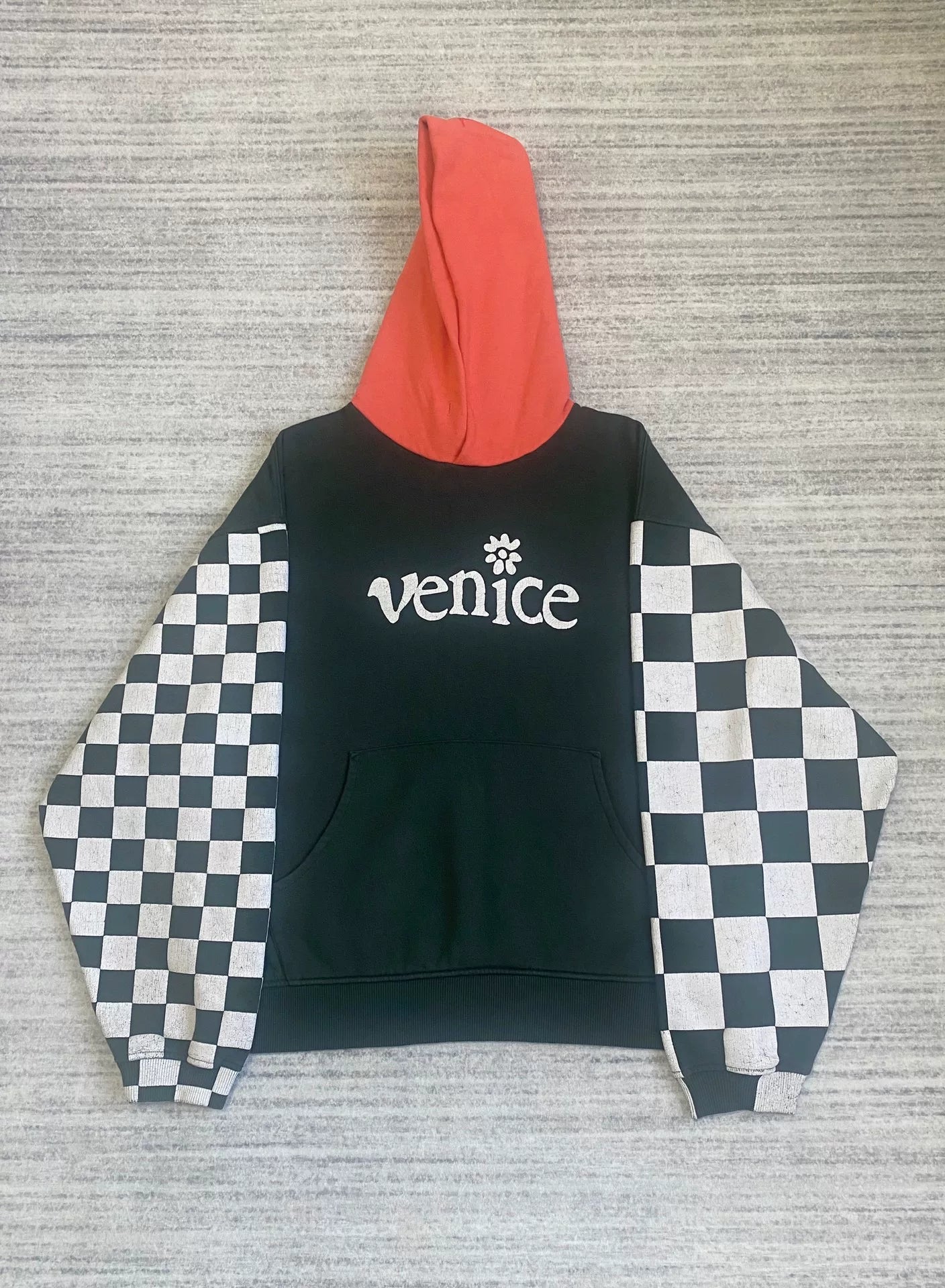 black and white checkered hoodie with red hood