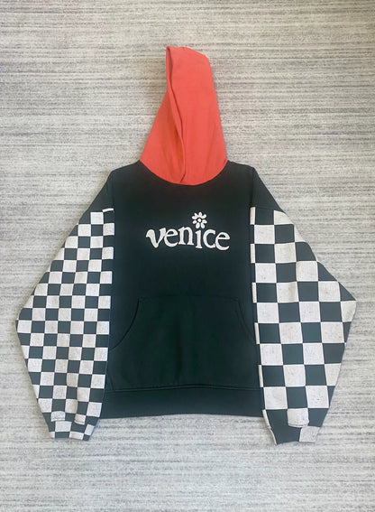 black and white checkered hoodie with red hood