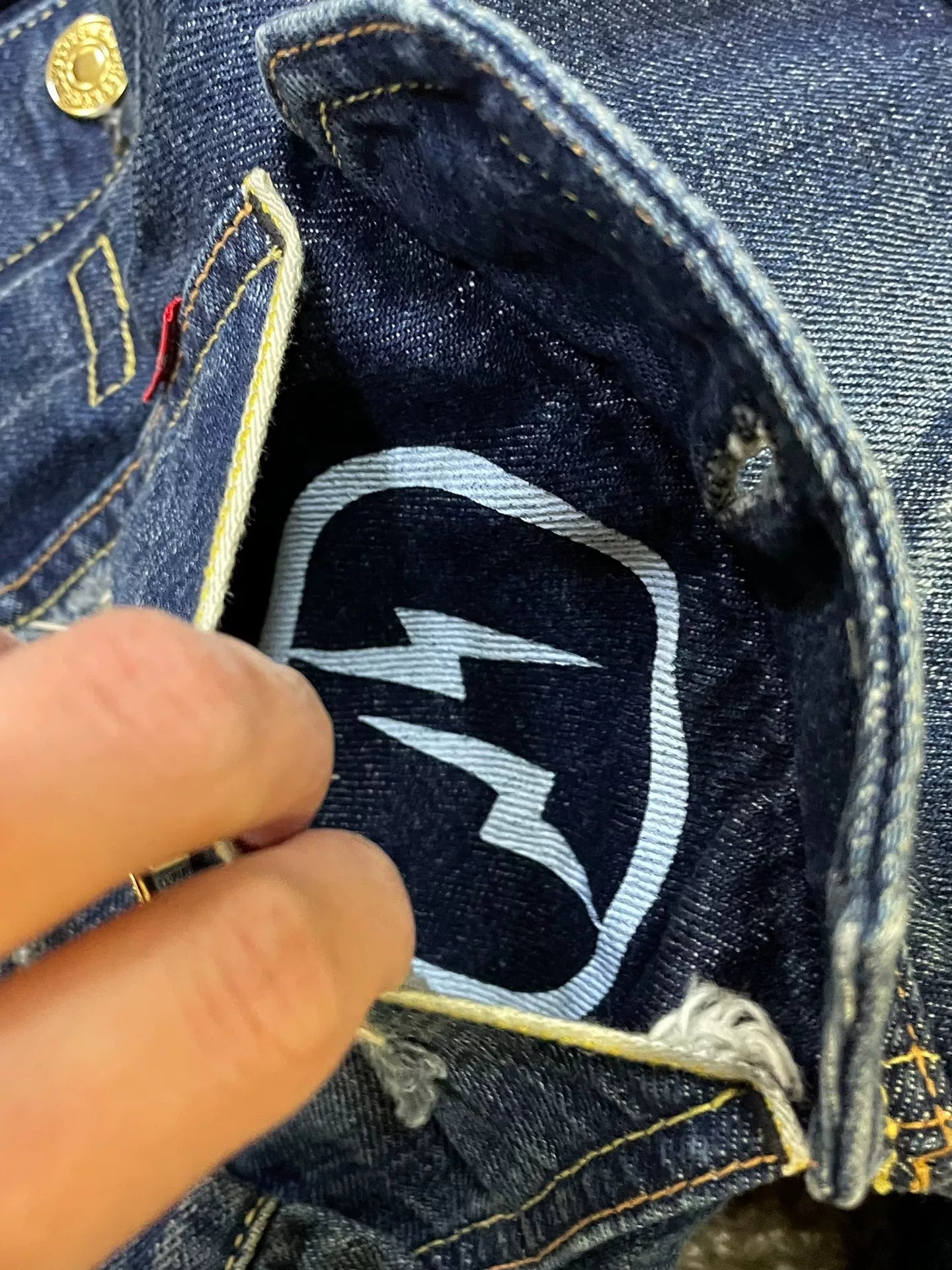 stylish blue denim jacket with gold buttons