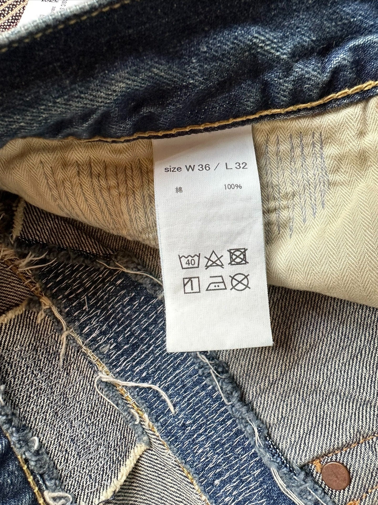 fdmtl classic fit red line distressed jeans