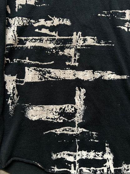 black long sleeve graphic top