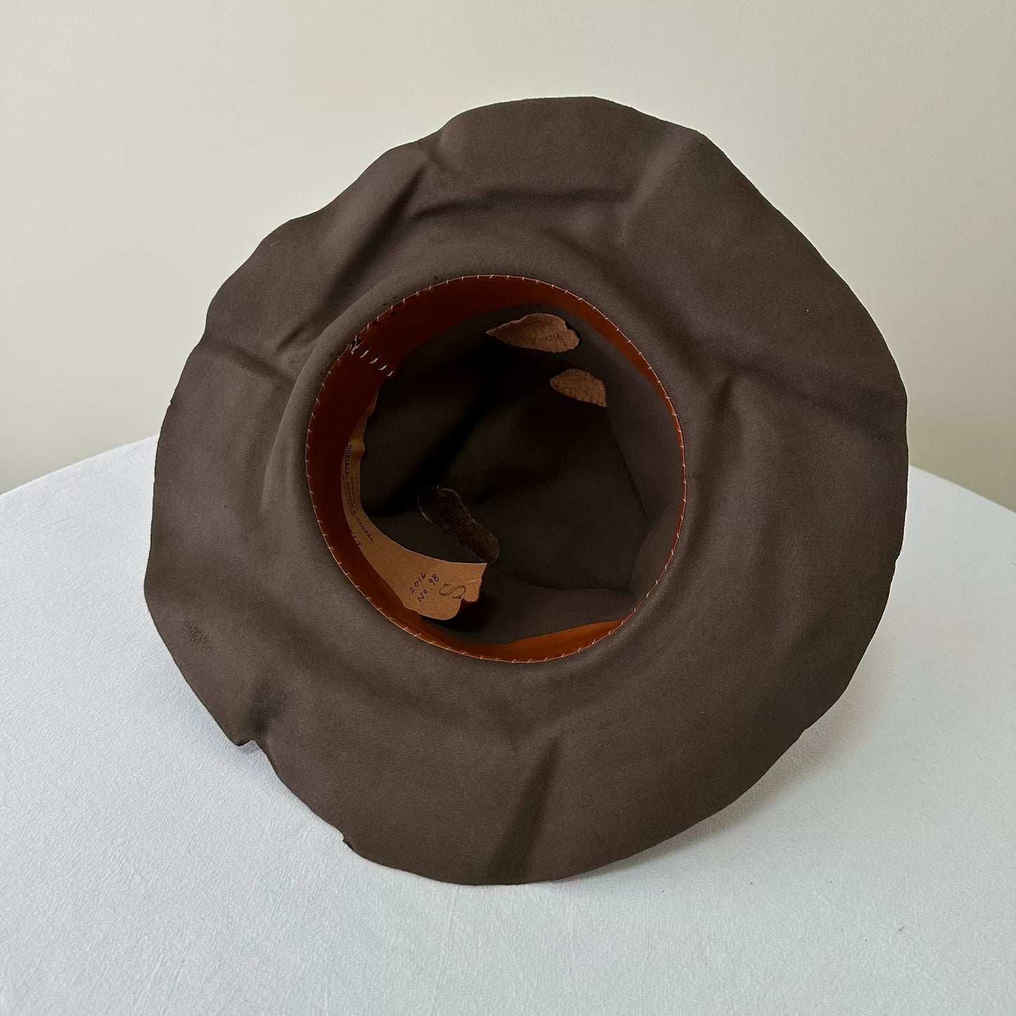 brown felt wide-brimmed hat
