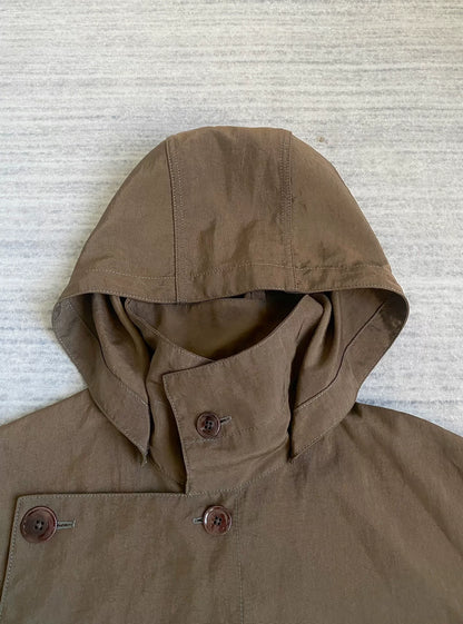 brown belted trench coat with military silhouette